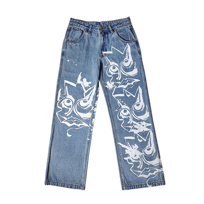 FEWOCiOUS Staring Painted Jeans featuring expressive screen printing on washed indigo denim